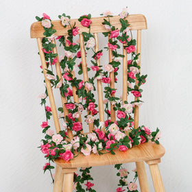 KHOYIME table decoration garland brightens centerpieces with soft pink blooms.