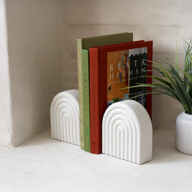 KIBAGA concrete bookends in light gray finish complement modern decor.