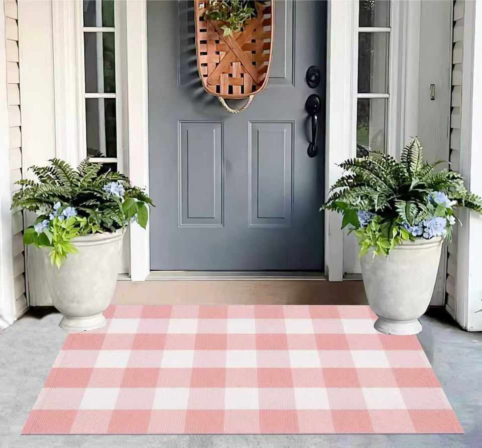 KIhipIoe buffalo plaid outdoor rug on front porch with washable convenience