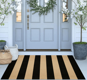 KIhipIoe durable woven rug withstands daily porch or entry use.