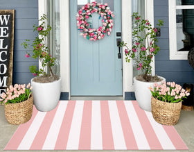 KIhipIoe pink and white striped outdoor rug 3x5 enhances porch curb appeal and is easy to clean.