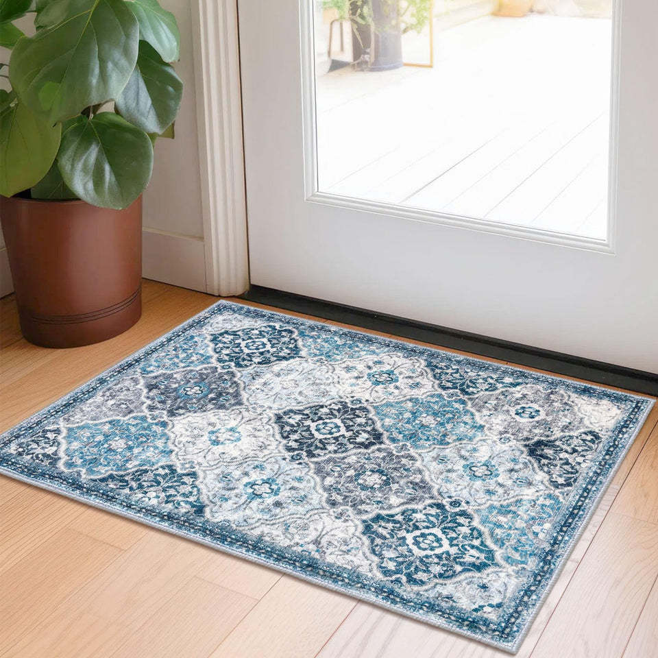 KILOCOCO 2x3 Moroccan floral rug in blue-multi adds soft color to entryways.