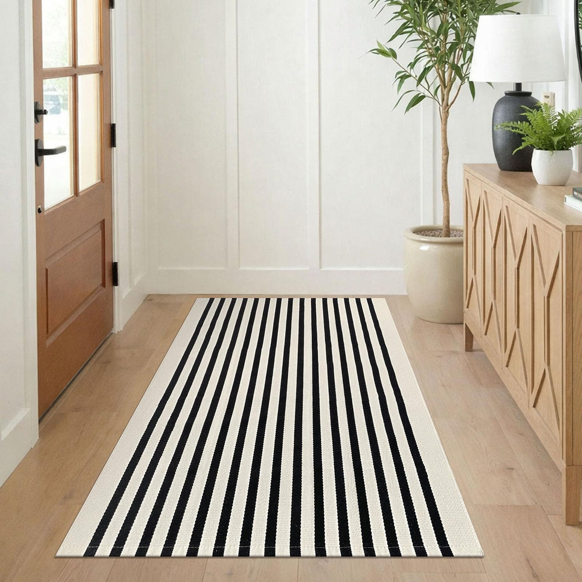 KILOCOCO Beige striped rug 3x5 creates a layered look under doors.