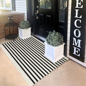 KILOCOCO Beige striped rug 3x5 at the front door for durable entryway appeal.
