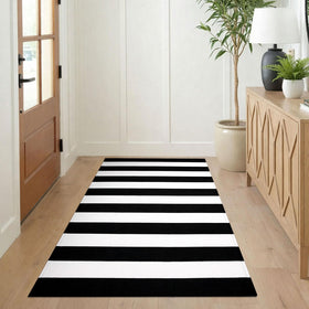 KILOCOCO striped outdoor mat complements entryways with modern contrast for curb appeal.