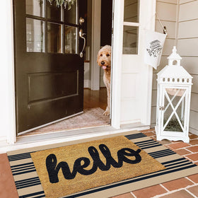 KILOCOCO striped rug woven texture adds timeless porch appeal.