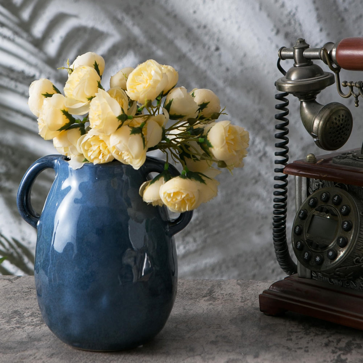 Kimdio blue glazed ceramic vase highlights vibrant color for modern farmhouse decor.