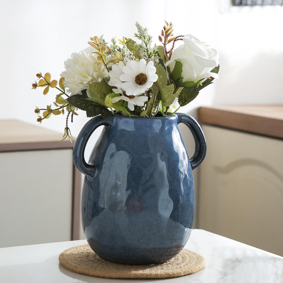 Kimdio versatile vase supports faux, fresh, or dried blooms in any room.