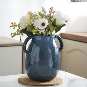 Kimdio versatile vase supports faux, fresh, or dried blooms in any room.