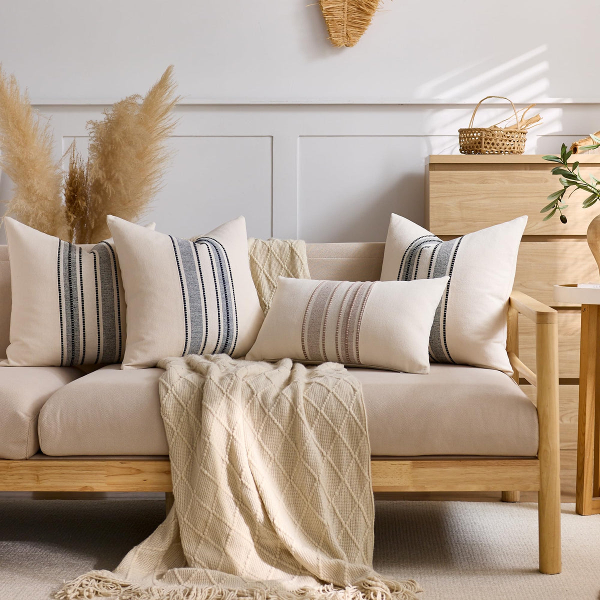 KINDREX neutral navy-blue pillow cover on sofa complements modern interiors