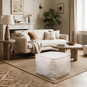 Kinevoli Square Pouf Supports lounging with high resilience foam and gentle give.