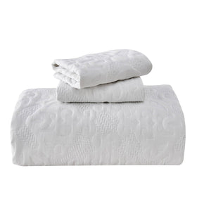 Kingnex bedspread ships compressed; washing helps reduce wrinkles.