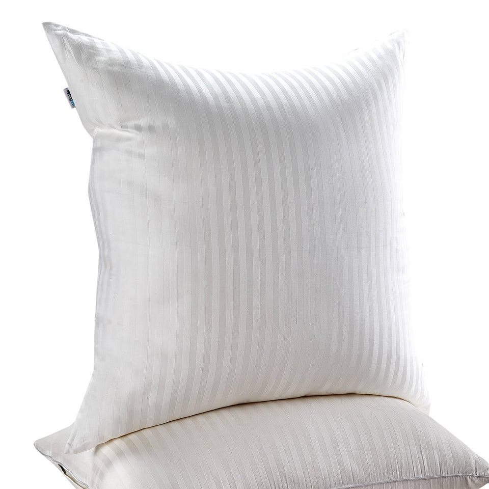 Kingnex Euro Pillow Insert 26x26 appearance enhances sofa decor with plush comfort.
