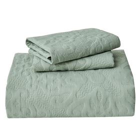 Kingnex sage-toned decorative bedspread enhances master or guest room décor.