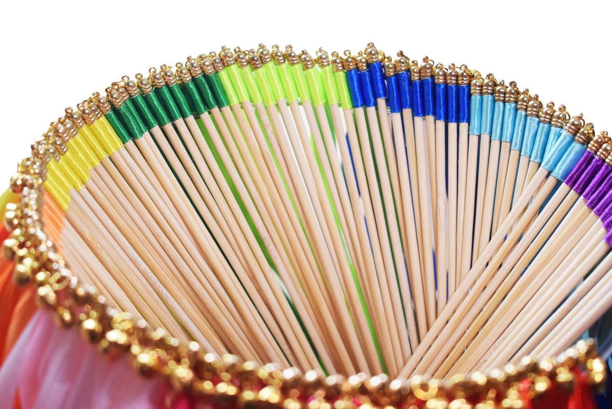 Kingsnow wedding send-off wands create a rainbow canopy of color.