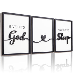 KIOSSUT 3D wood sign above bed; three framed panels add bedroom texture.