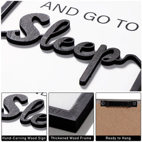 KIOSSUT 3D wood sign in black and white above bed enhances calm bedroom vibe.