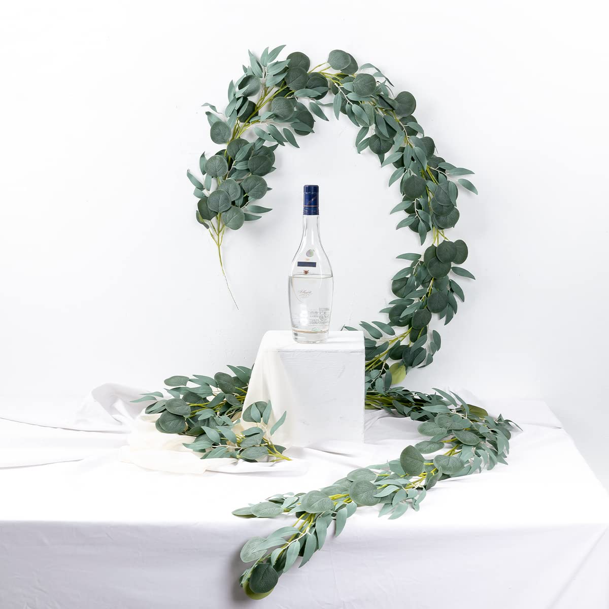 Kisflower eucalyptus garland enhances doors or swings with natural charm