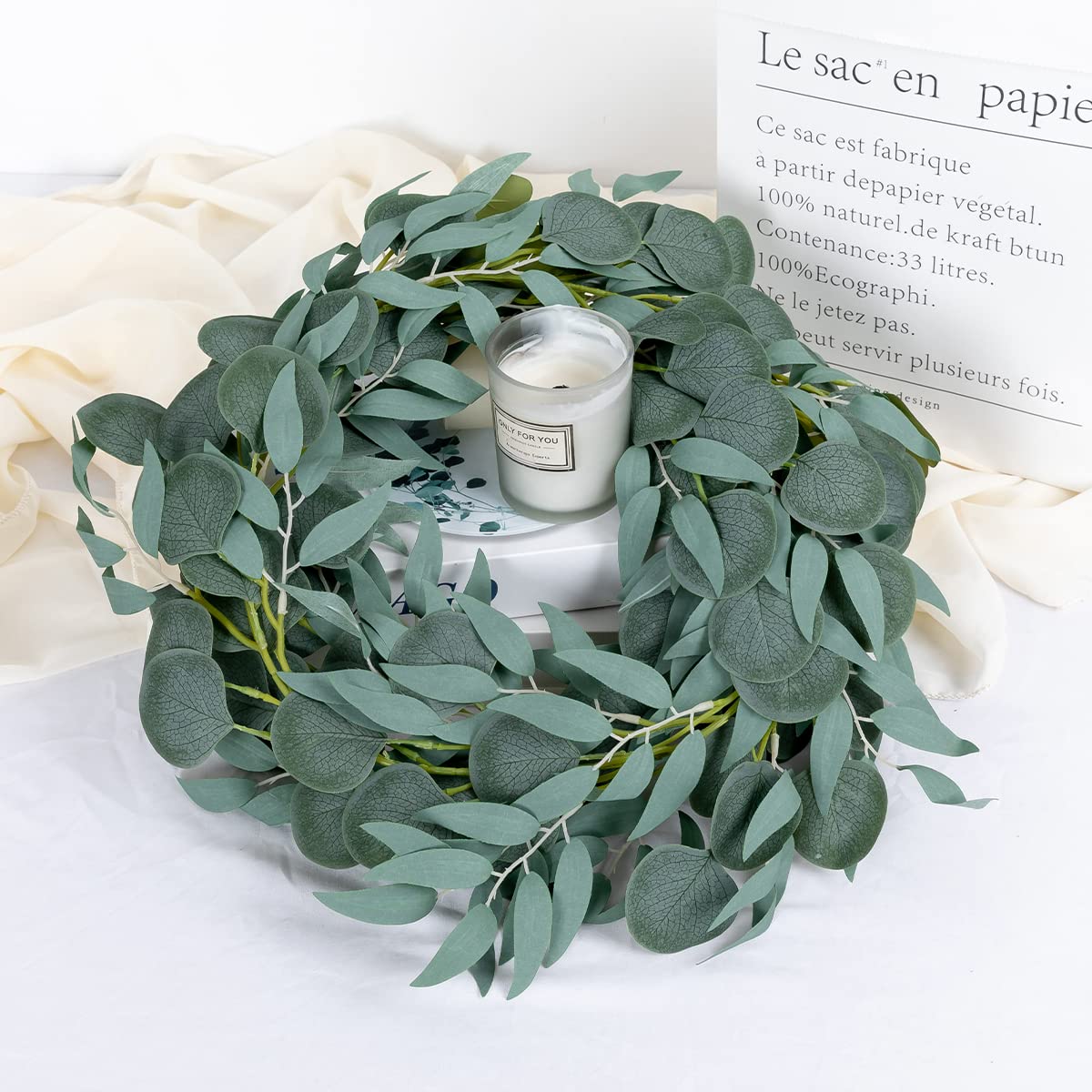 Kisflower eucalyptus garland adorns mantels with evergreen allure and easy styling
