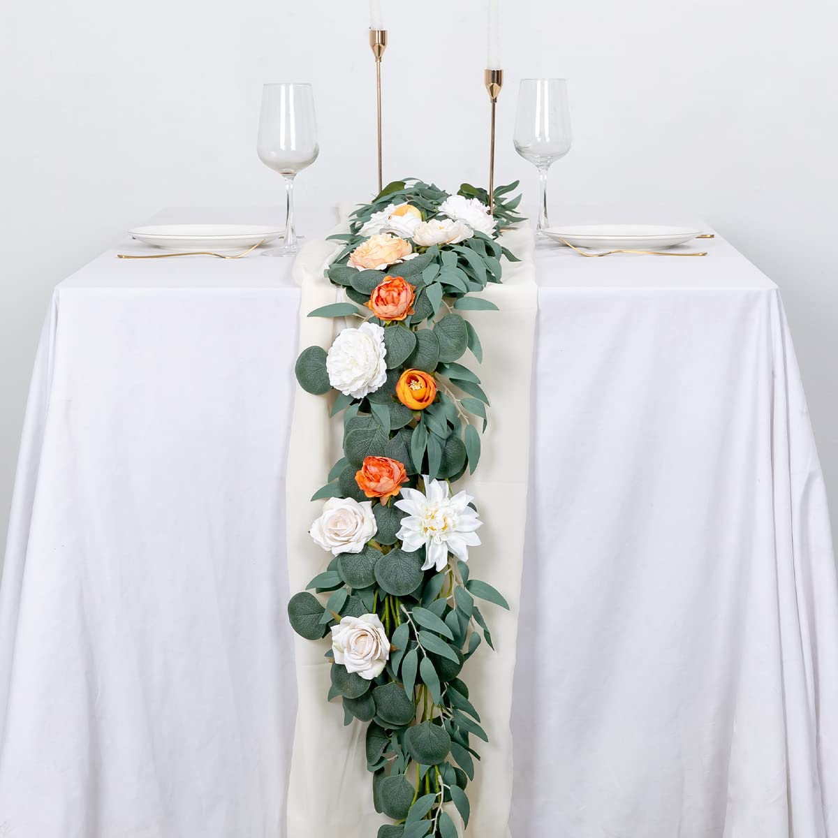 Kisflower eucalyptus garland creates lush wall backdrop for photo-ready spaces