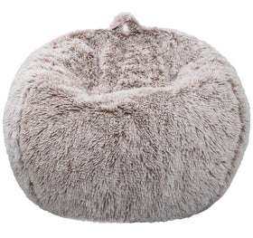 Kisoy storage cover on sofa shows cozy seating and toy organization.