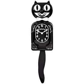 Kit Cat Klock small cat-face with rolling eyes adds nostalgic charm.