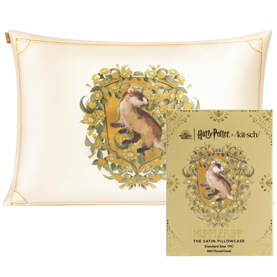 Kitsch Hufflepuff crest on toddler pillowcase with zipper for secure fit.