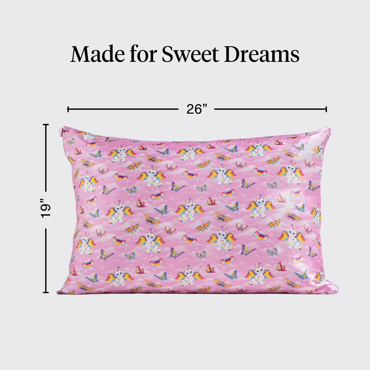 Kitsch Lisa Frank pillowcase on bed demonstrates wrinkle-free, stay-in-place design.