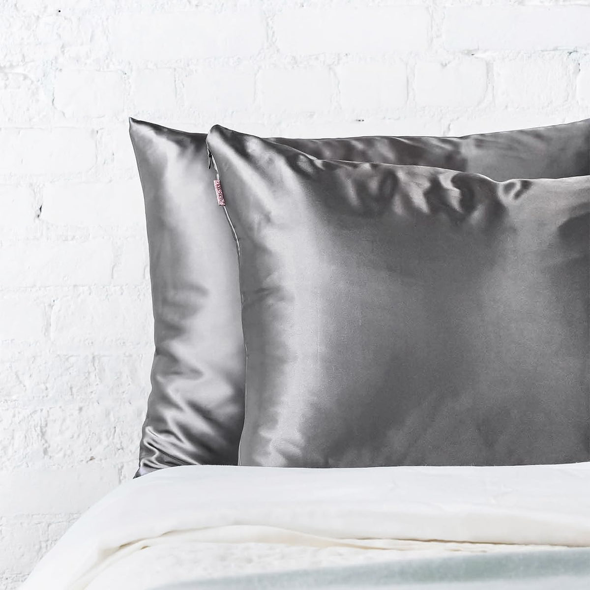 Kitsch satin pillowcase machine washable for easy care.