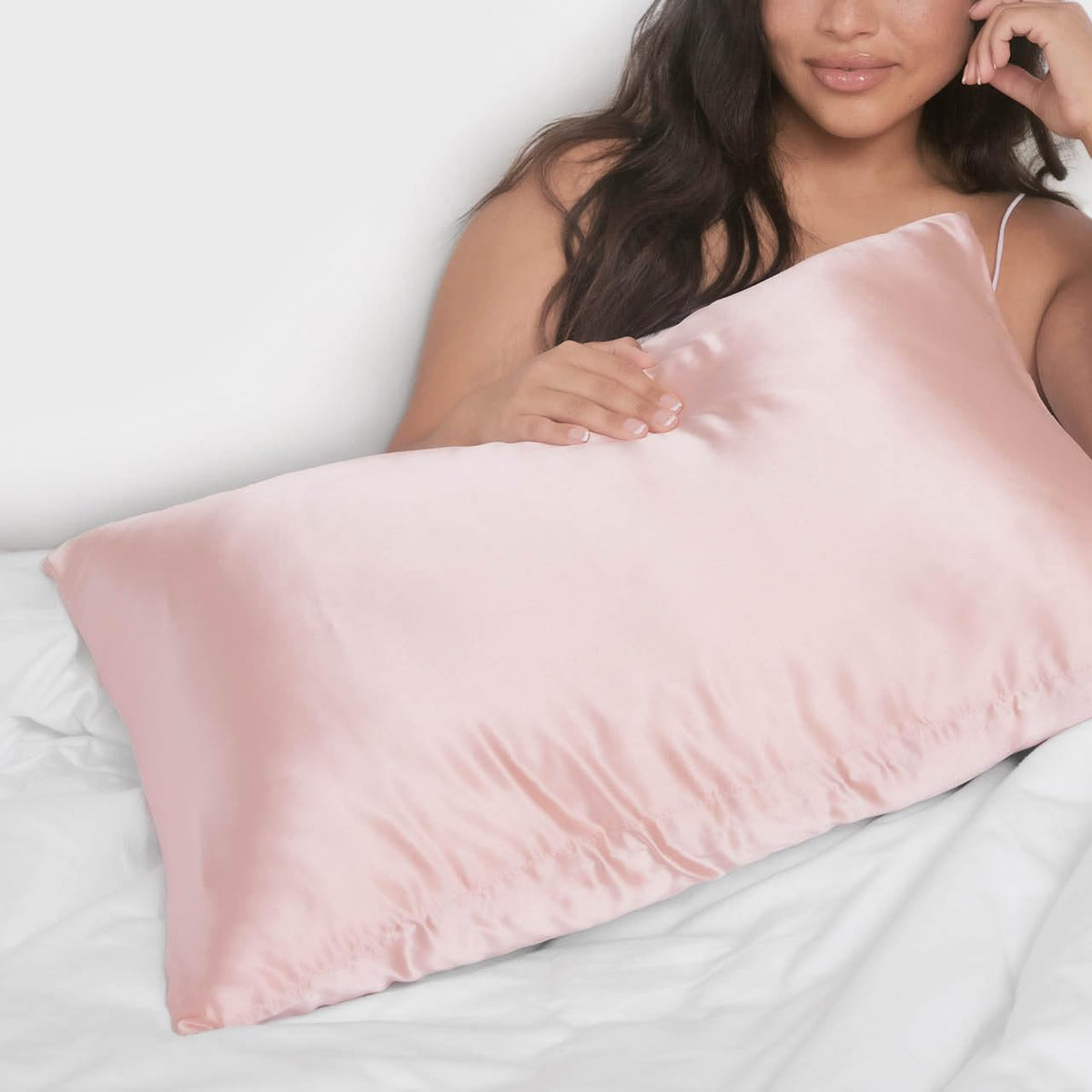 Kitsch satin pillowcase provides a wrinkle-free, sleek bed look.