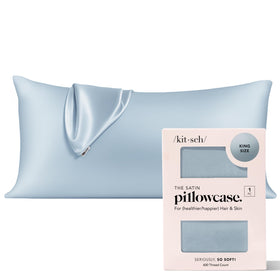 Kitsch satin pillowcase with zipper close-up showing secure fit for restful sleep.