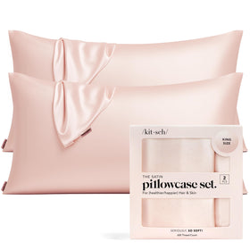 Kitsch satin pillowcase with zipper closure prevents slipping for secure overnight fit.