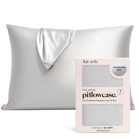Kitsch satin pillowcase with zipper on standard pillow for secure sleep.