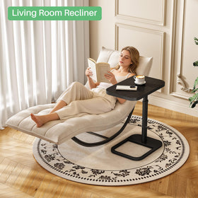 Kitstorack space-saving side table slides under sofa for easy access.