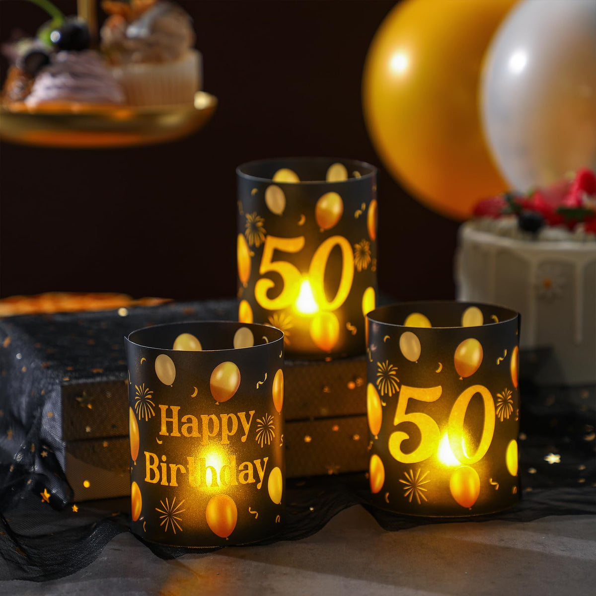 Kittmip black and gold decor enhances adult birthday party visuals.