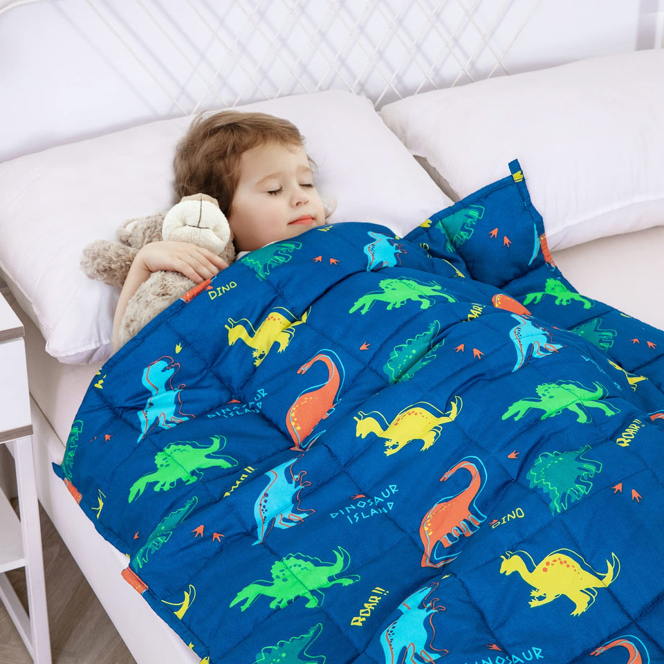 Kivik blue dinosaur weighted blanket 36x48 provides comforting warmth for bedtime