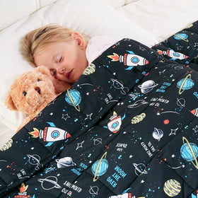 Kivik cooling weighted blanket with universe print shows even weight distribution.