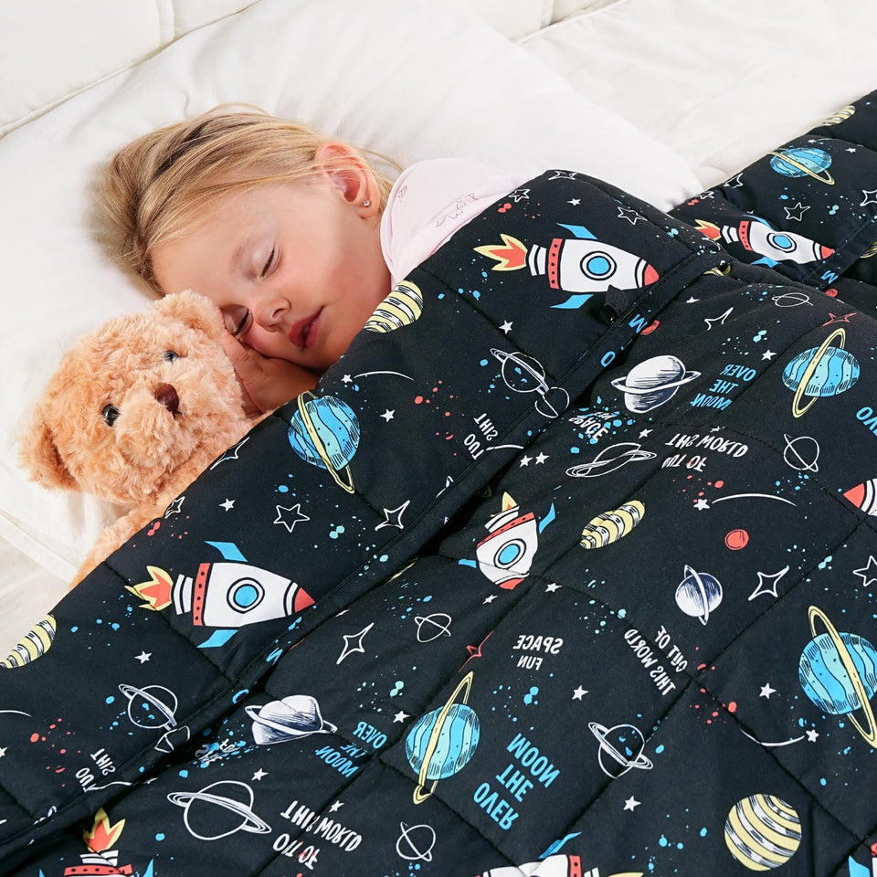 Kivik cooling weighted blanket with universe print shows even weight distribution.
