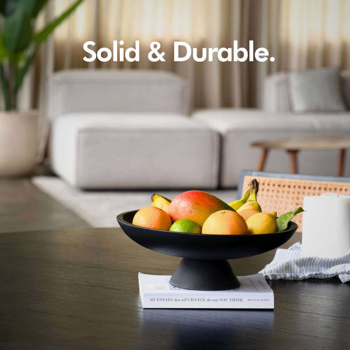 KIVY concrete fruit bowl dusk-black finish complements modern kitchens and entryways.