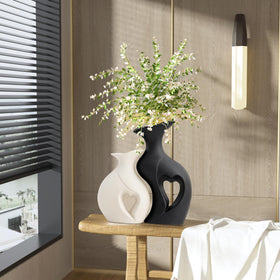 KKgoubz handmade ceramic vases add texture to mantels and entryways.