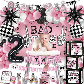 Klarvyius Bad Two the Bone cake topper creates a bold birthday focal point.