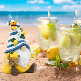 KnomeKo gnome with lemon flower hat, holding a lemon and lemonade for vibrant decor.