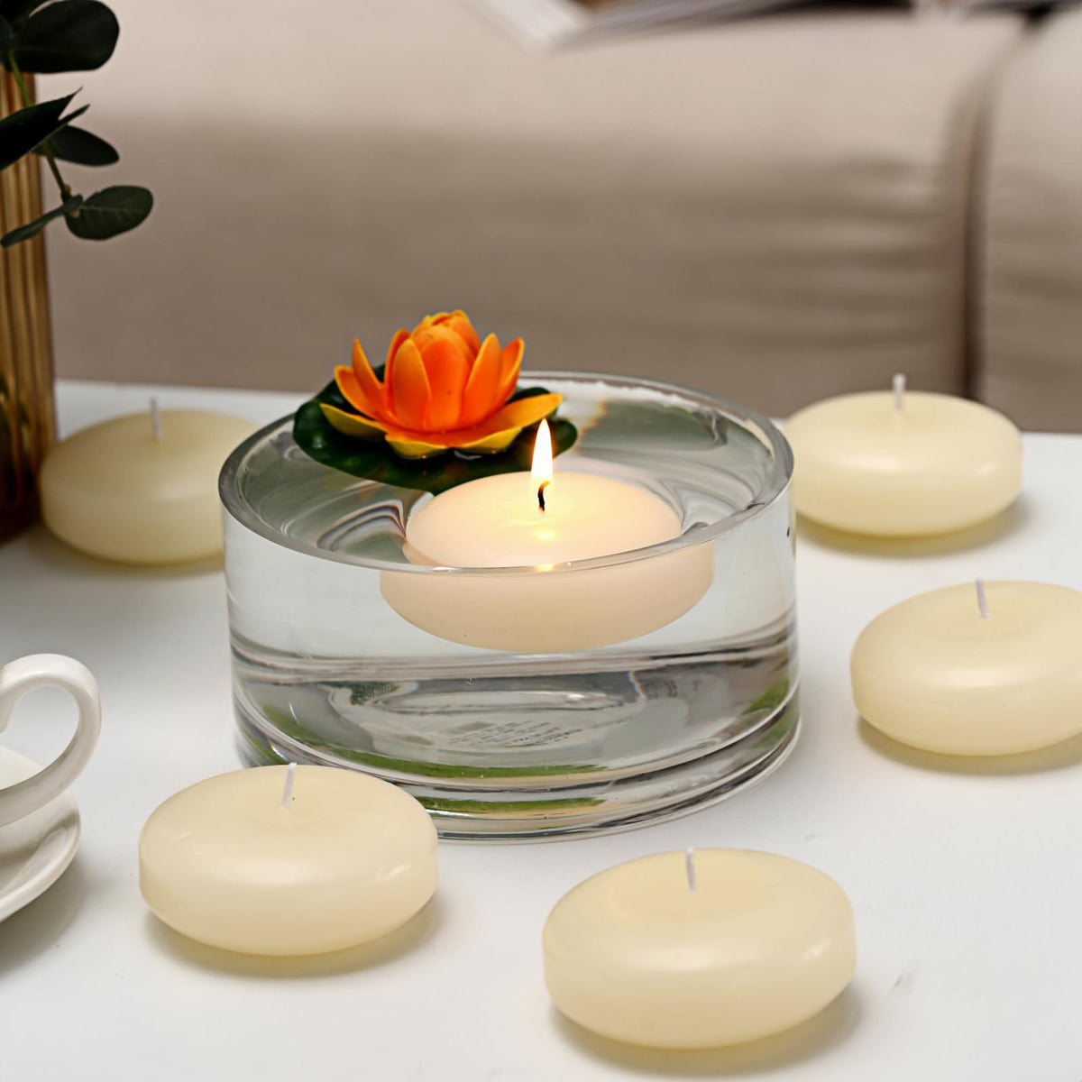 KNOURT candle floating on water bowl creating serene ambience at events.
