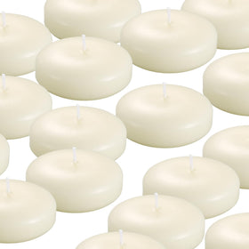 KNOURT ivory 3-inch floating candle resting in a glass basin for a soft centerpiece.
