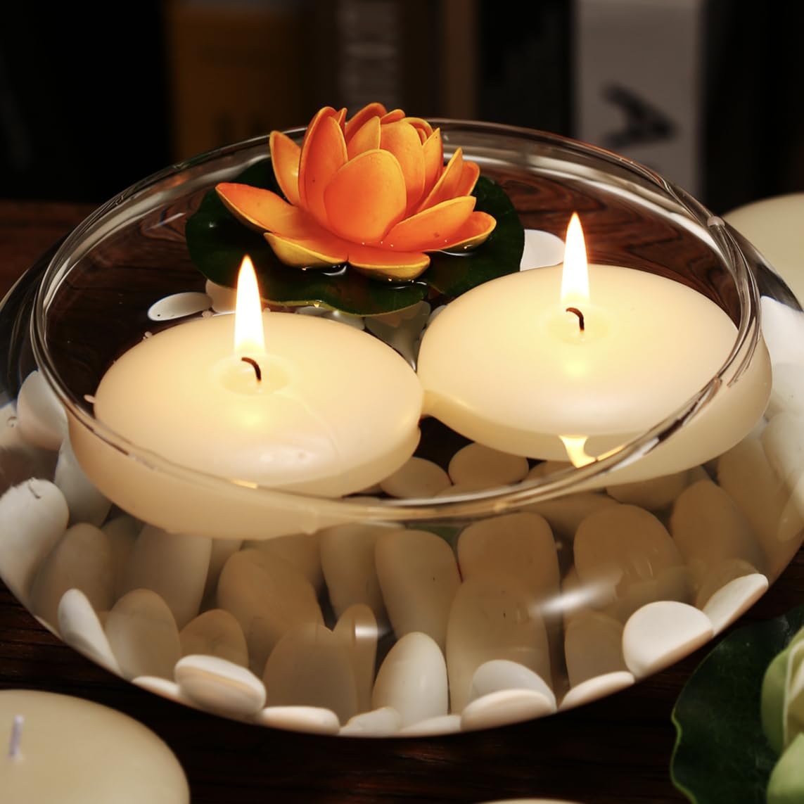 KNOURT wedding ambiance candle shining in a centerpiece for celebrations.