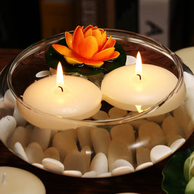 KNOURT wedding ambiance candle shining in a centerpiece for celebrations.