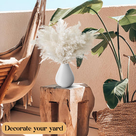 Kocat nursery decor pampas grass adds soft visual interest.