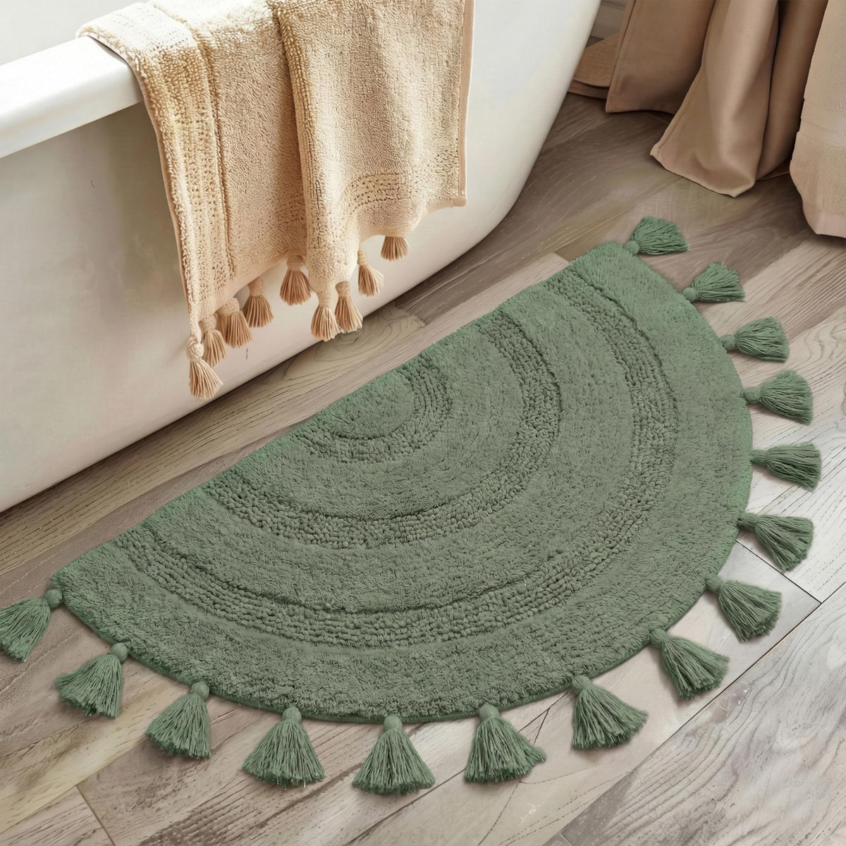 KOEXM half-circle boho rug with tassels adds soft texture to bathroom floors
