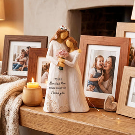 Kohehe emotional keepsake features a gentle hug and floral details.