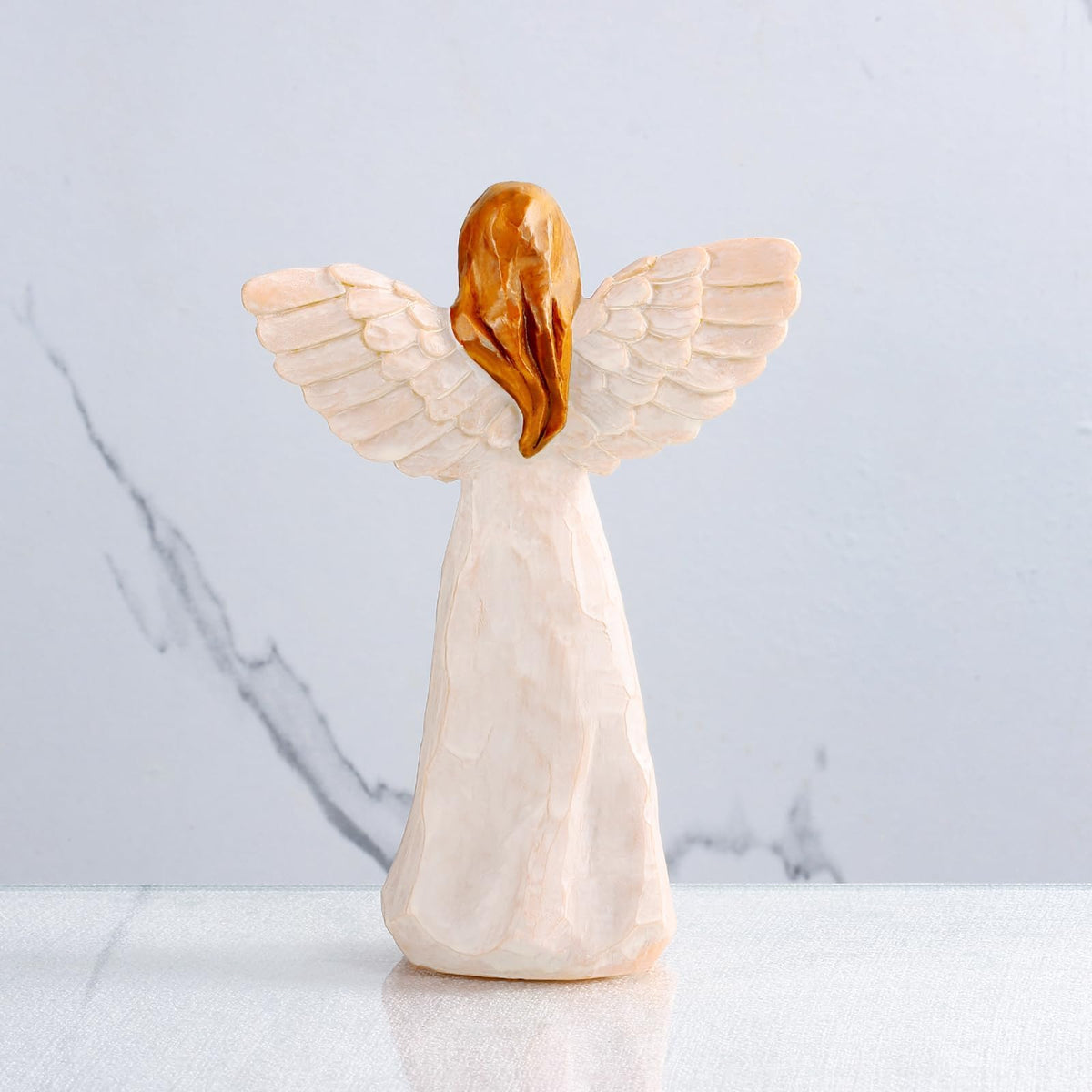 Kohehe hand-painted resin angel with bright wings elevates display.